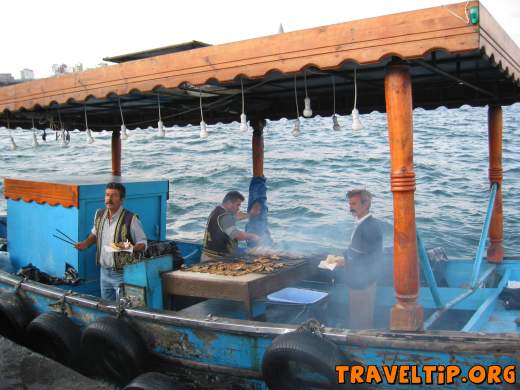 Turkey - Istanbul - The Grand Bazaar - These guys were tied up near the market and selling BBQ fish in bread. Tasted
great and was really cheap. One of the many hundreds of food options at or near
the market